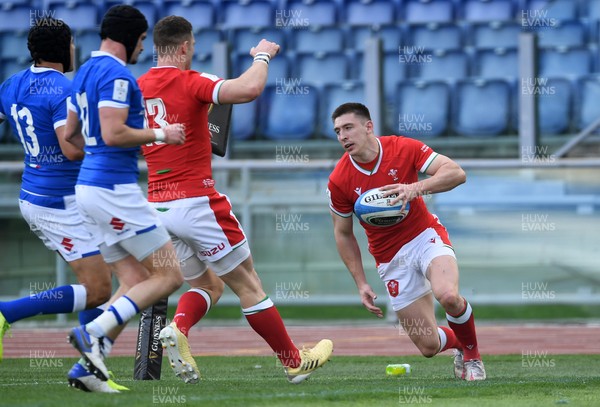 130321 - Italy v Wales - Guinness Six Nations - Josh Adams of Wales celebrates scoring a try