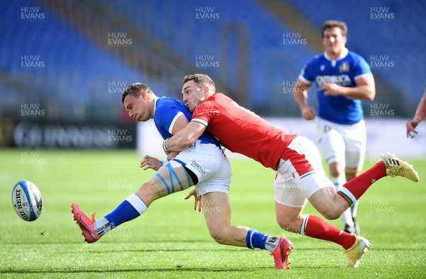 130321 - Italy v Wales - Guinness Six Nations - Paolo Garbisi of Italy is tackled by George North of Wales