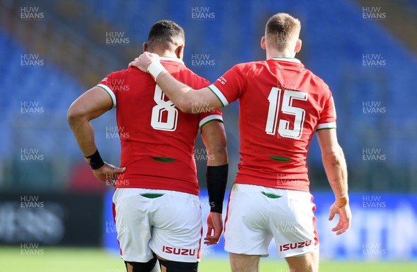 130321 - Italy v Wales - Guinness Six Nations - Taulupe Faletau of Wales gets an arm round the shoulder from Liam Williams after he scores a try
