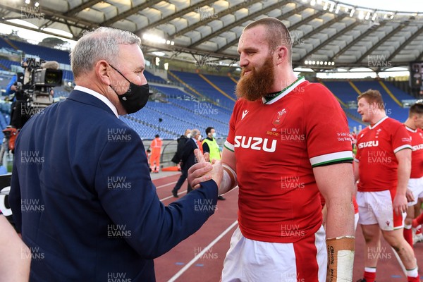 130321 - Italy v Wales - Guinness Six Nations - Wales head coach Wayne Pivac with Jake Ball at full time