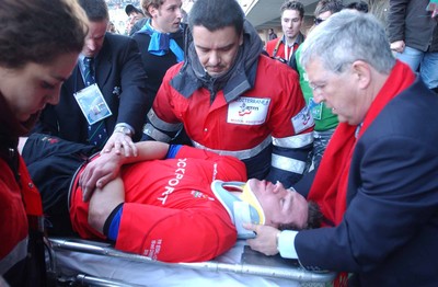 150203 - Italy v Wales - Six Nations Championship - Wales' Mark Jones is stretchered from the field  