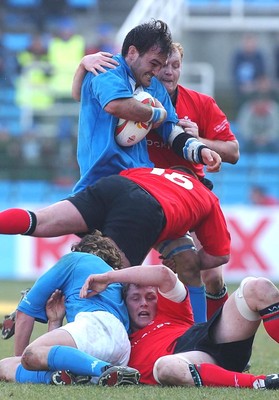 150203 - Italy v Wales - Six Nations Championship -  Italy's Matthew Phillips is tackled by Martyn Williams  