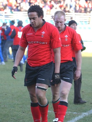 150203 - Italy v Wales - Six Nations Championship - Wales' Gavin Thomas and Tom Shanklin leave the field dejected