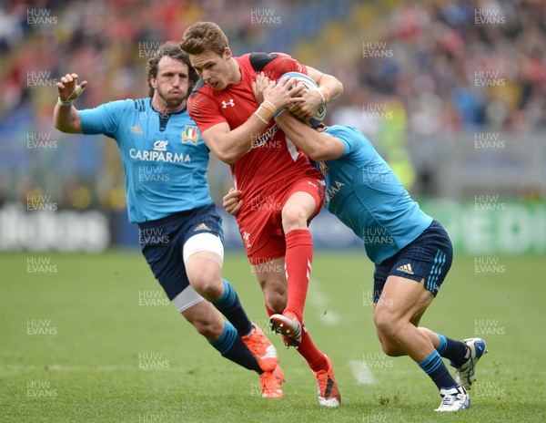 210315 - Italy v Wales - RBS 6 Nations 2015 -Liam Williams of Wales is tackled by Giovanbattista Venditti of Italy