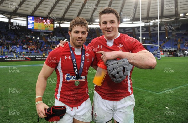 230213 - Italy v Wales - RBS Six Nations -Leigh Halfpenny and Jonathan Davies of Wales celebrate at the end of the game