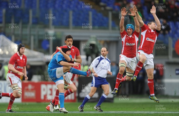 230213 - Italy v Wales - RBS Six Nations -Kristopher Burton of Italy clears the ball