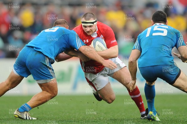 230213 - Italy v Wales - RBS Six Nations -Ken Owens of Wales takes on Davide Giazzon of Italy