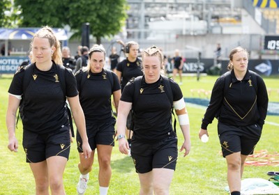 270425 - Italy v Wales, Guinness Women’s Six Nations 2025 -Carys Cox of Wales, Abbie Fleming of Walesand Lleucu George of Wales arrive at the stadium ahead of the match