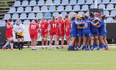 270425 - Italy v Wales, Guinness Women’s Six Nations 2025 - Italy celebrate the win as Wales regroup at the end of the match