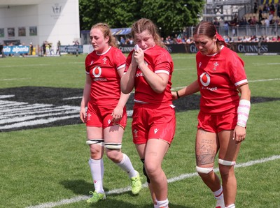 270425 - Italy v Wales, Guinness Women’s Six Nations 2025 - Abbie Fleming of Wales, Kate Williams of Wales and Georgia Evans of Wales at the end of the match