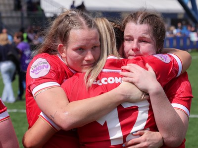 270425 - Italy v Wales, Guinness Women’s Six Nations 2025 - Carys Cox of Wales, Courtney Keight of Wales and Kate Williams of Wales at the end of the match