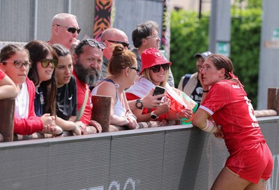 270425 - Italy v Wales, Guinness Women’s Six Nations 2025 - Georgia Evans of Wales with family and friends at the end of the match