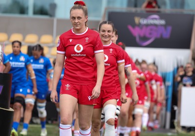 270425 - Italy v Wales, Guinness Women’s Six Nations 2025 - Wales Captain Hannah Jones leads the team out at the start of the match