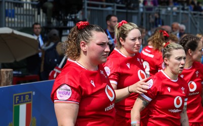 270425 - Italy v Wales, Guinness Women’s Six Nations 2025 - Gwenllian Pyrs of Wales, Gwen Crabb of Wales and Keira Bevan of Wales at the end of the match