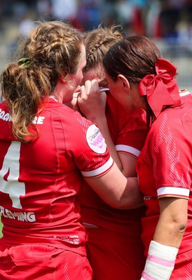 270425 - Italy v Wales, Guinness Women’s Six Nations 2025 - Kate Williams of Wales, Abbie Fleming of Wales and Georgia Evans of Wales at the end of the match