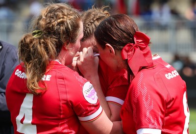 270425 - Italy v Wales, Guinness Women’s Six Nations 2025 - Kate Williams of Wales, Abbie Fleming of Wales and Georgia Evans of Wales at the end of the match