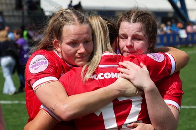 270425 - Italy v Wales, Guinness Women’s Six Nations 2025 - Carys Cox of Wales, Courtney Keight of Wales and Kate Williams of Wales at the end of the match