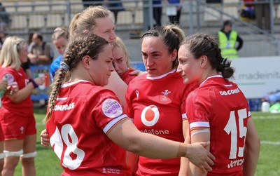 270425 - Italy v Wales, Guinness Women’s Six Nations 2025 - Jenni Scoble of Wales, Courtney Keight of Wales and Jasmine Joyce of Wales at the end of the match