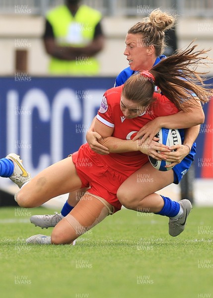 270425 - Italy v Wales, Guinness Women’s Six Nations 2025 - Lisa Neumann of Wales is tackled by Francesca Sgorbini of Italy