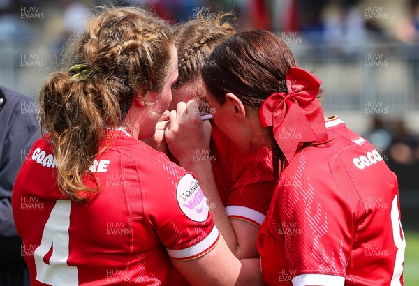 270425 - Italy v Wales, Guinness Women’s Six Nations 2025 - Kate Williams of Wales, Abbie Fleming of Wales and Georgia Evans of Wales at the end of the match