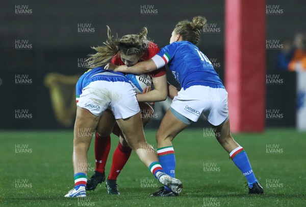 090219 - Italy v Wales - Guinness Women's Six Nations -  Hannah Jones of Wales tackled by Michela Sillari and Veronica Madia of Italy