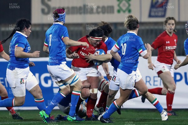 090219 - Italy v Wales - Guinness Women's Six Nations -  Amy Evans tackled by Sofia Stefan