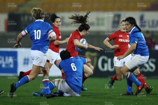 090219 - Italy v Wales - Guinness Women's Six Nations -  Robyn Wilkins tackled by Ilaria Arrighetti
