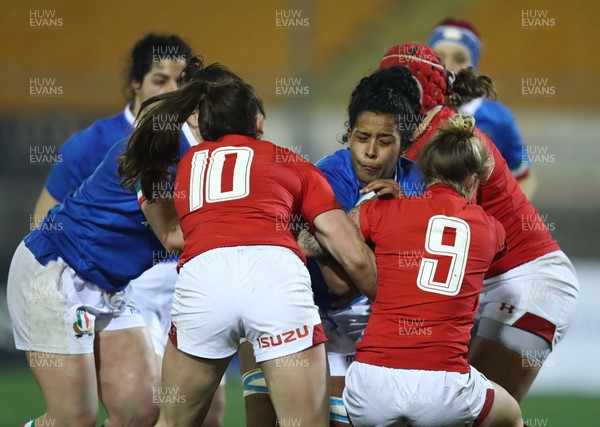 090219 - Italy v Wales - Guinness Women's Six Nations -  Keira Bevan and Robyn Wilkins of Wales tackle Giada Franco of Italy