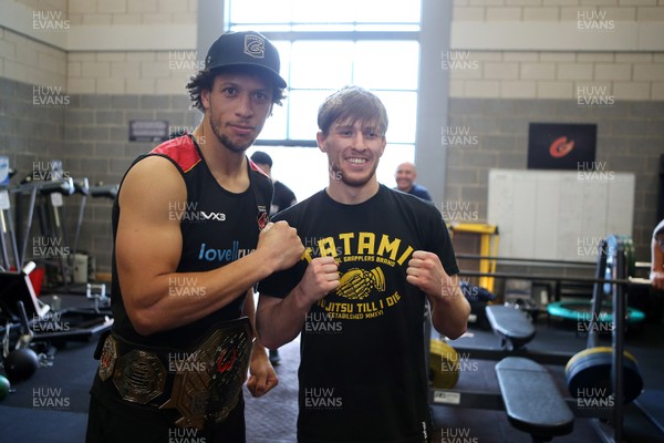 180419 - MMA fighter and Cage Warriors World Champion Jack Shore trains at Dragons Rugby HQ - Zane Kirchner with the belt