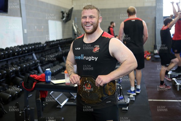 180419 - MMA fighter and Cage Warriors World Champion Jack Shore trains at Dragons Rugby HQ - Huw Fairbrother with the belt