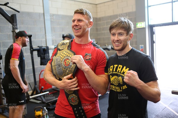 180419 - MMA fighter and Cage Warriors World Champion Jack Shore trains at Dragons Rugby HQ - Jack Dixon and Jack with the belt