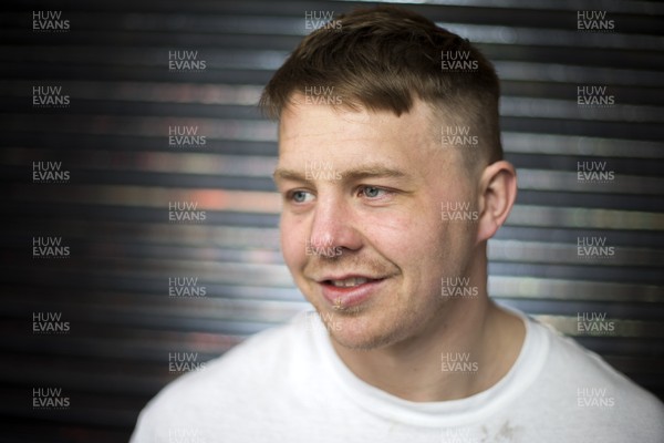 290318 - Picture shows Scarlets player James Davies near his home in Cardiff