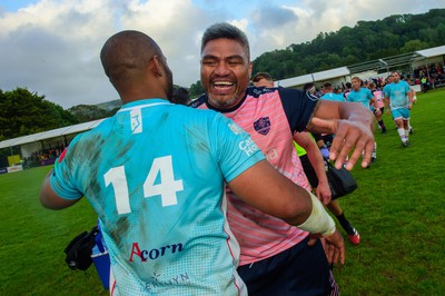 100622 - James Hook Select XV v Classic Lions XV - James Hook Testimonial Match - Nick Williams of Classic Lions greets Aled Brew of James Hook XV