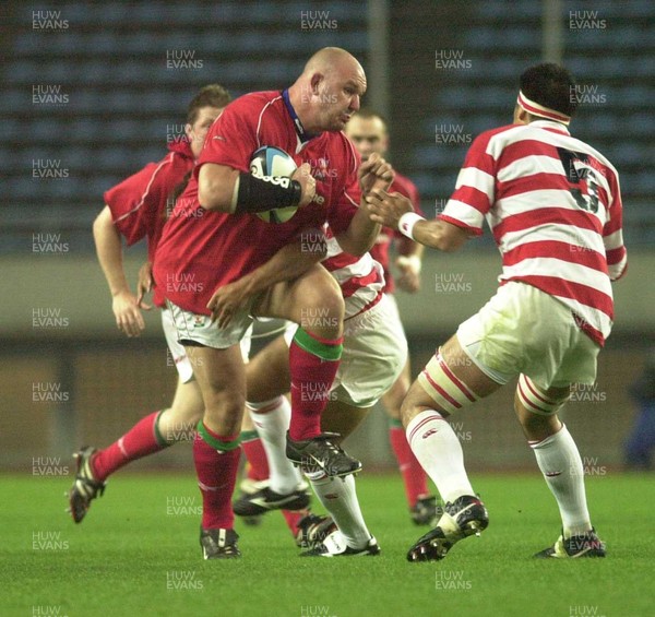 060601 - Japan Select XV v Wales - Craig Quinnell takes on Jun Akune
