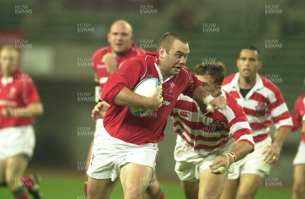 060601 - Japan Select XV v Wales - Chris Anthony beats tackle by Adam Parker