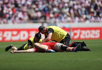 050725 - Japan v Wales - Summer Tour First Test - Ben Carter of Wales goes down injured