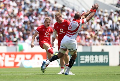 050725 - Japan v Wales - Summer Tour First Test - Sam Costelow of Wales kicks the ball