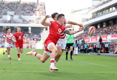 050725 - Japan v Wales - Summer Tour First Test - Josh Adams of Wales is denied a try by Ichigo Nakakusu of Japan who is yellow carded, and Wales awarded a penalty try