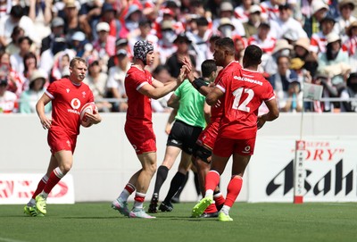 050725 - Japan v Wales - Summer Tour First Test - Tom Rogers of Wales celebrates scoring a try with team mates