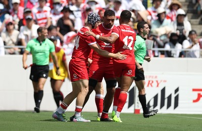 050725 - Japan v Wales - Summer Tour First Test - Tom Rogers of Wales celebrates scoring a try with team mates