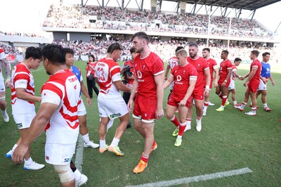 050725 - Japan v Wales - Summer Tour First Test - James Ratti of Wales shakes hands with the opposition at full time