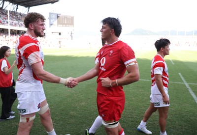 050725 - Japan v Wales - Summer Tour First Test - Teddy Williams of Wales shakes hands with the opposition at full time