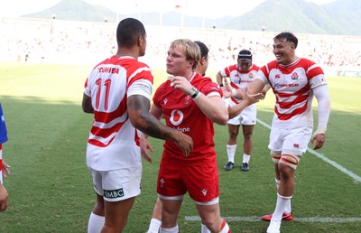 050725 - Japan v Wales - Summer Tour First Test - Blair Murray of Wales shakes hands with the opposition at full time