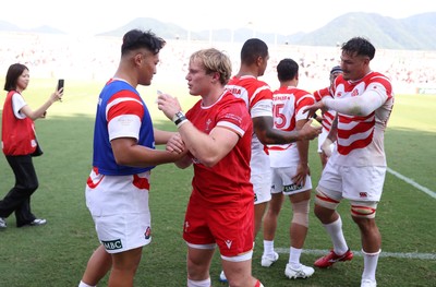 050725 - Japan v Wales - Summer Tour First Test - Blair Murray of Wales shakes hands with the opposition at full time