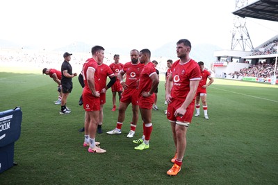050725 - Japan v Wales - Summer Tour First Test - Josh Adams, Ben Thomas and James Ratti of Wales at full time