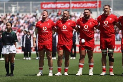 050725 - Japan v Wales - Summer Tour First Test - Dewi Lake, Nicky Smith, Gareth Thomas and Ben Thomas of Wales sing the anthem