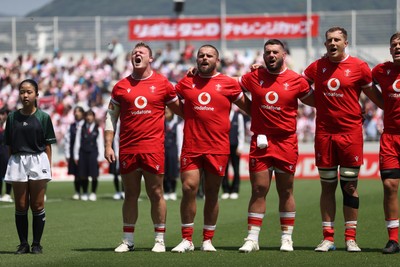 050725 - Japan v Wales - Summer Tour First Test - Dewi Lake, Nicky Smith, Gareth Thomas and Ben Thomas of Wales sing the anthem