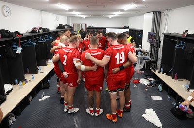 050725 - Japan v Wales - Summer Tour First Test - Wales team huddle in the dressing room