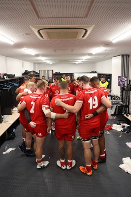 050725 - Japan v Wales - Summer Tour First Test - Wales team huddle in the dressing room