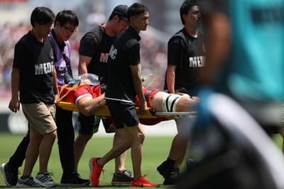 050725 - Japan v Wales - Summer Tour First Test - Ben Carter of Wales is taken off the field injured